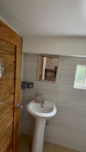 Dusj, håndklær og såpe