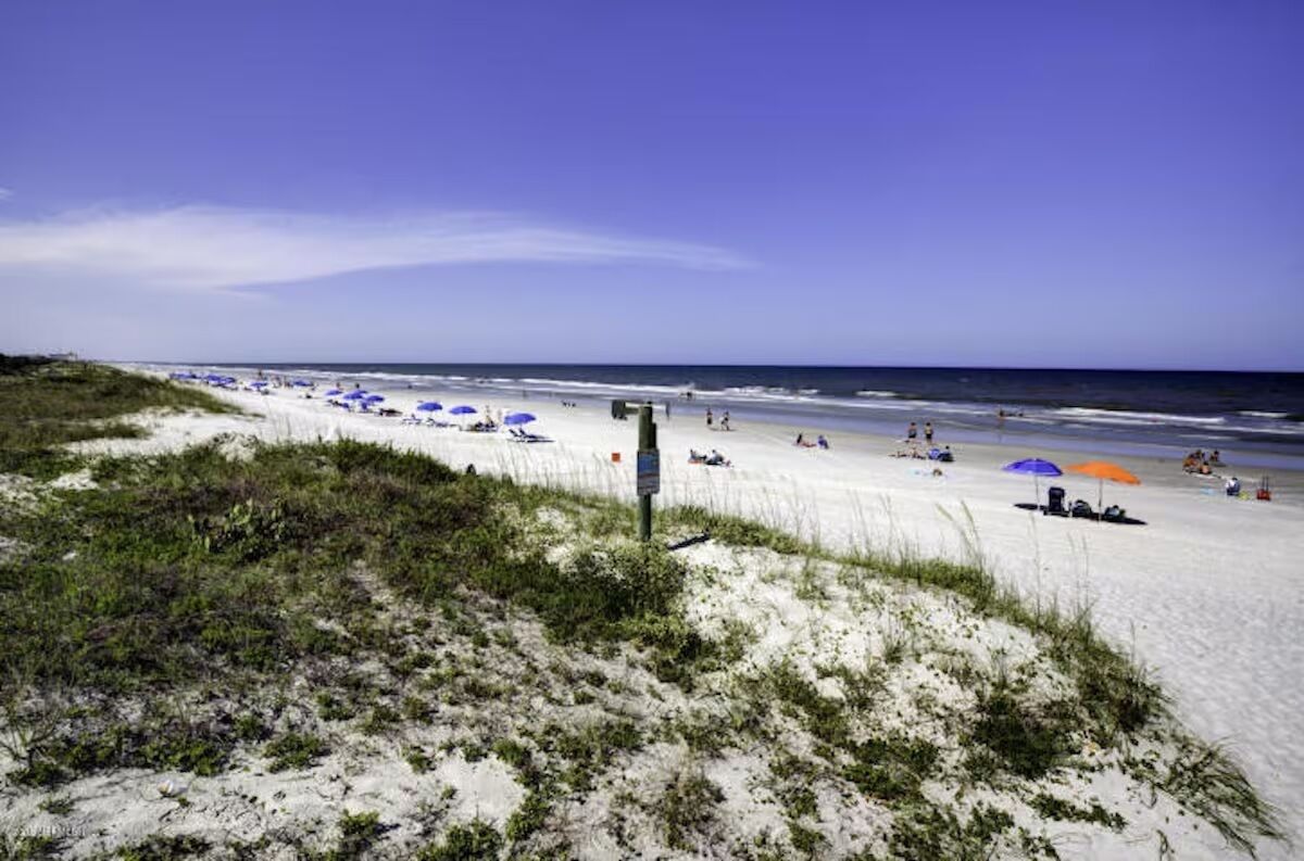 On the beach, sun-loungers, beach towels
