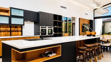 Coffee/tea maker, fridge, microwave, oven