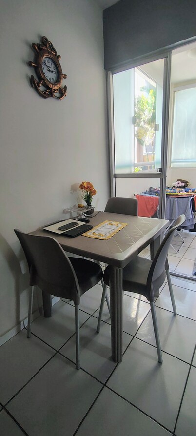 Located across from the shopping mall, near restaurants, beaches, and a water park.