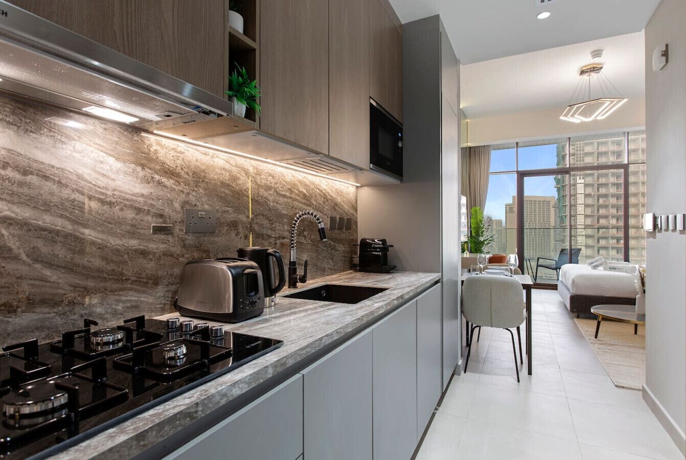 Fridge, microwave, stovetop, coffee/tea maker