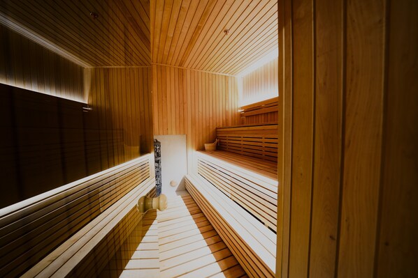 Sauna y tina de hidromasaje