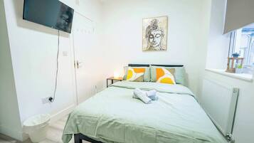 1 slaapkamer, een strijkplank/strijkijzer, wifi, beddengoed