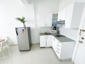 شقة إستديو جونيور | مطبخ خاص | موقد طهي مسطح، ماكينة لصنع القهوة/الشاي، مستلزمات طهي/أطباق/أوعية