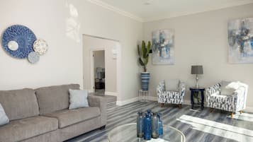 Luxury Penthouse, Sea View | Living area | 32-inch TV with digital channels