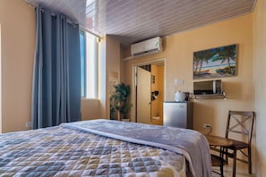 Comfort Room, 1 Bedroom, Sea View | In-room safe, desk, iron/ironing board, free WiFi