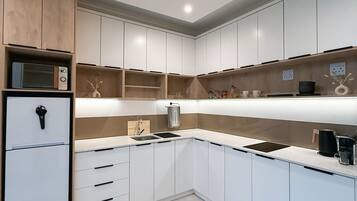 Superior Apartment, Patio, Ground Floor | Private kitchen | Espresso maker, coffee/tea maker, electric kettle