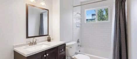 Hair dryer, towels, soap, toilet paper