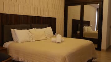 Comfort suite | Een kluis op de kamer, geluiddichte muren, een strijkplank/strijkijzer