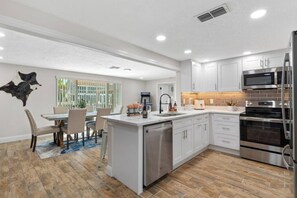 Fridge, stovetop, dishwasher, coffee/tea maker - 4BR Waterfront | Boat Dock + Pool | 11-Min Walk to Beach | Sleeps 8 (Hudson)