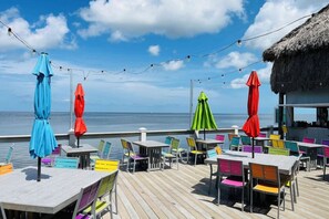 Outdoor dining - 4BR Waterfront | Boat Dock + Pool | 11-Min Walk to Beach | Sleeps 8 (Hudson)
