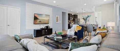 Télévision, cheminée, baby-foot