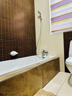 Hair dryer, towels, soap, toilet paper