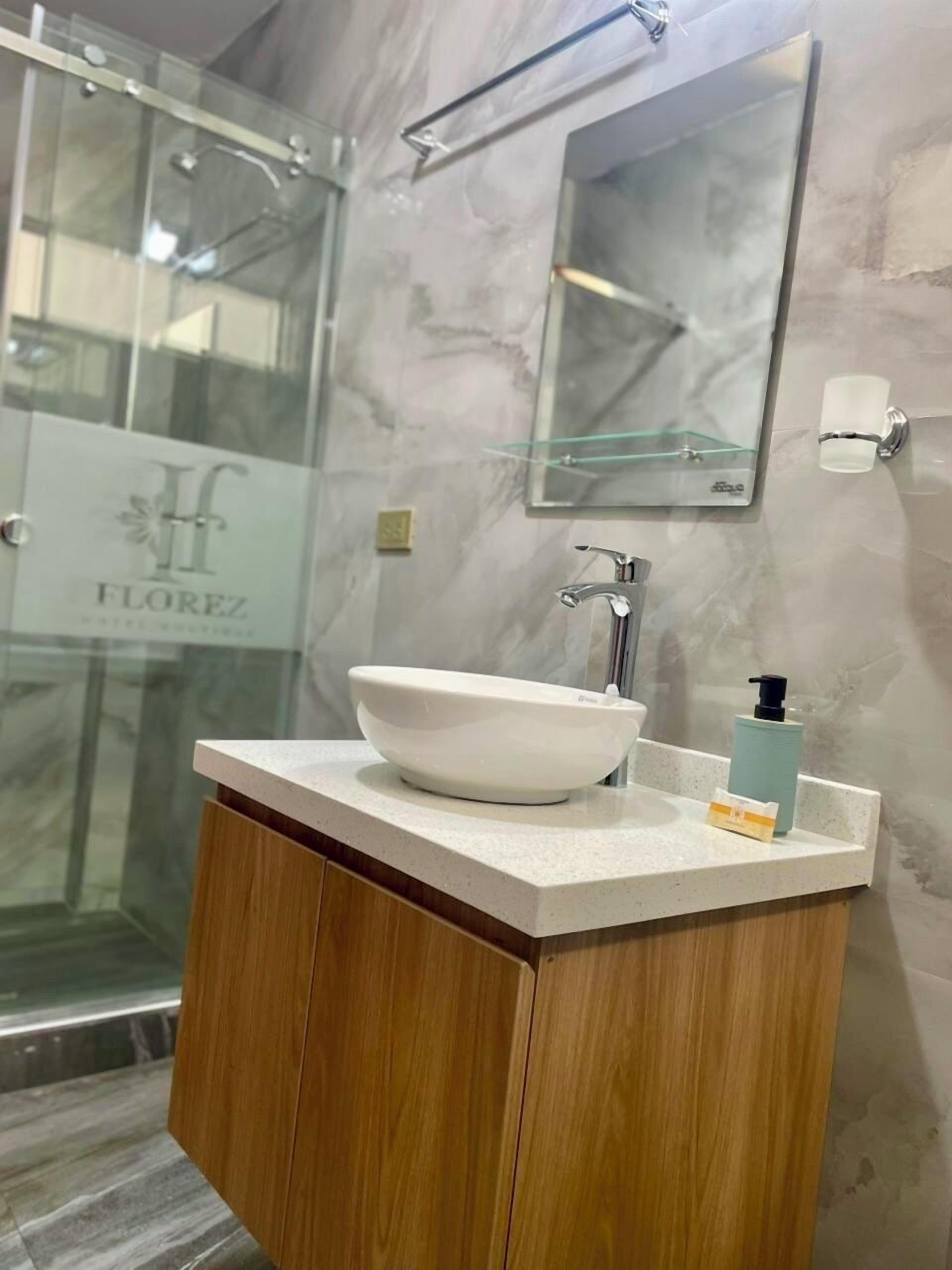 Family Twin Room | Bathroom | Towels, soap, shampoo, toilet paper