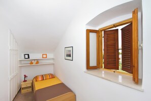 Apartment, Sea View | Laptop workspace, iron/ironing board, free WiFi