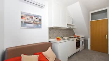 Departamento, 1 cama Queen size y sofá cama | Área de sala de estar