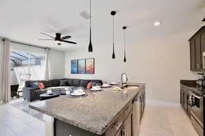 Fridge, microwave, oven, stovetop - Newly Updated 4BR TownHome with Pool at Storey Lake Resort (Kissimmee)