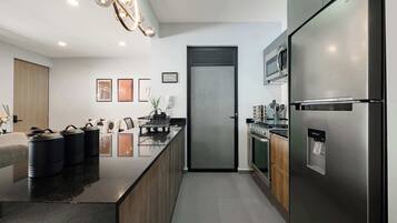 Departamento, varias camas, cocina, vista a la ciudad (Coahuila 193 - 308) | Cocina privada