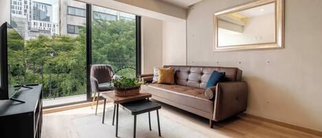 Departamento, varias camas, balcón, vista a la ciudad (Rio Neva 38 - (01)) | Área de sala de estar