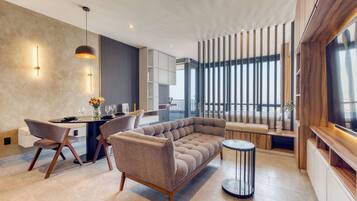 Estudio, 1 cama Queen size, cocina, vista a la ciudad (Be Grand Reforma 3805) | Área de sala de estar