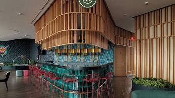 Studio, 1 Queen Bed, Kitchen, City View (Sky Town 2004) | Bar (on property)