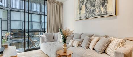 Apartment, Multiple Beds, Kitchen, City View (Unico Roma Torre Maple 302) | Living area