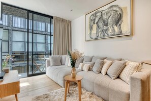 Apartment, Multiple Beds, Kitchen, City View (Unico Roma Torre Maple 302) | Living area - Centric 2 BR Condo - Gym - Open Air Cinema (Mexico City)