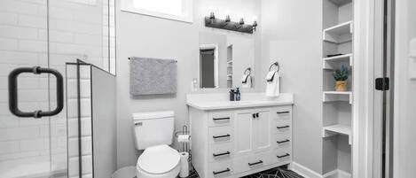 Shower, hair dryer, towels, soap