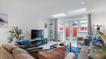 Family House | Living area | 42-inch Smart TV with satellite channels, Netflix, streaming services