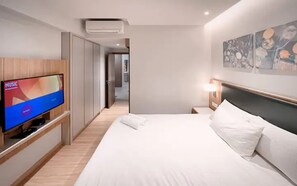 Suite familiare, 3 camere da letto, accesso al Club Lounge, vista città | Biancheria in cotone egiziano, biancheria da letto di alta qualità