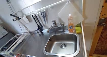 A hole in the ground downtown! 311 Fully equipped kitchen & rooms for long term stays