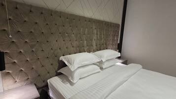 Blackout curtains, iron/ironing board, free WiFi, bed sheets