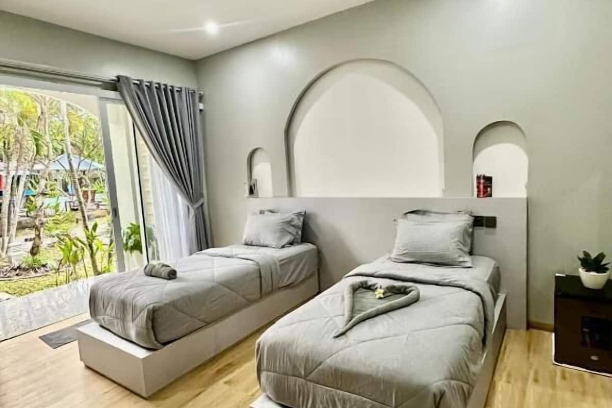 Family Room, 3 Bedrooms, Garden View | Desk, free WiFi