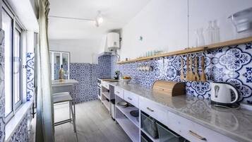 Fridge, oven, electric kettle, toaster