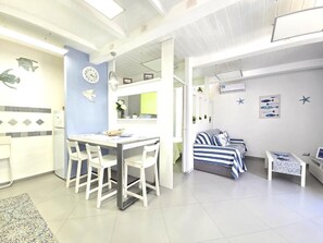 City Duplex, Partial Sea View | Living area | 40-inch Smart TV with digital channels - Starview (Vico Equense)