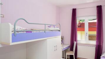 Down duvets, desk, laptop workspace, blackout curtains