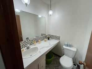 Shower, towels, soap, toilet paper