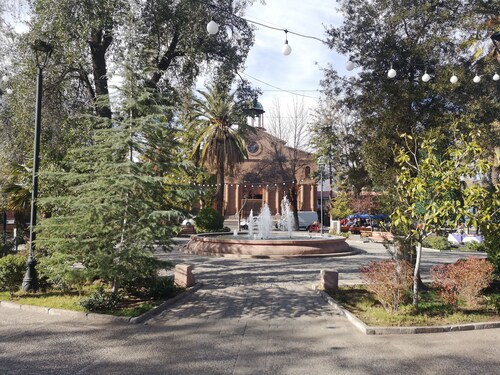 Centrally located, secure house with parking.