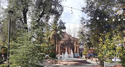 Centrally located, secure house with parking.