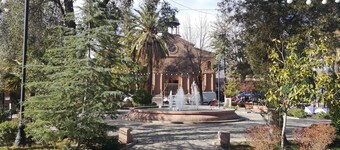 Centrally located, secure house with parking.