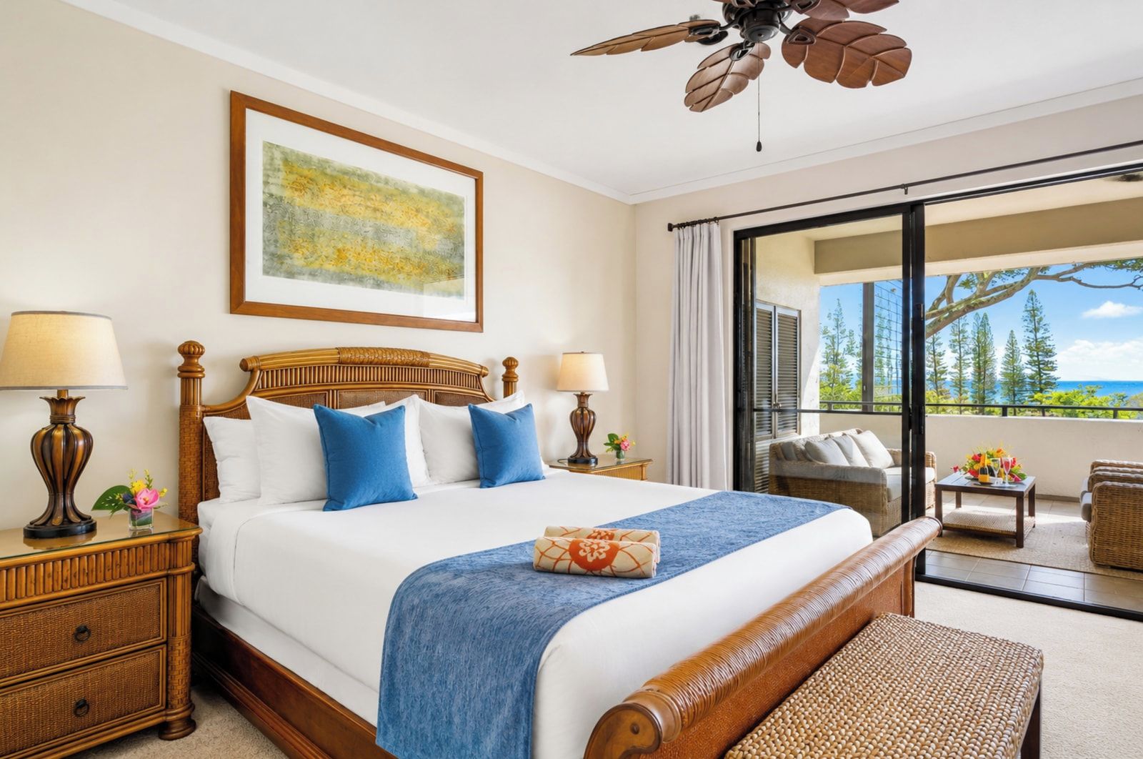 The king bedroom offers a comfortable retreat with ceiling fan, warm furnishings, and an ensuite bath just steps away. KGV-18T4