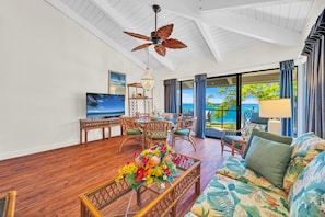 Spacious, vaulted-ceiling living room with tropical flair and wall-to-wall ocean views for the ultimate island retreat. NAP-C37 - Napili Point | Oceanfront 5 BR, Sleeps 16 | Car Incl. w/ 6+ Nights | NAP ML-2459 by KBM (Lahaina)