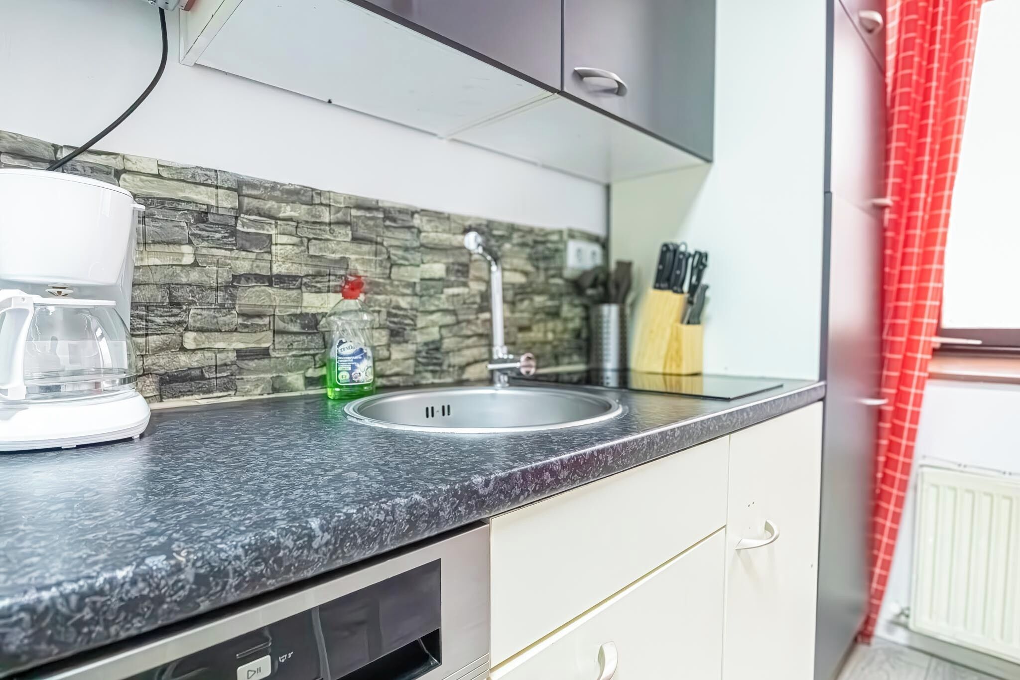 Apartamento básico | Cozinha privada | Frigobar, micro-ondas, cooktop, lava-louças