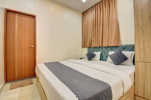 Standard Double Room, City View | Desk, blackout curtains, iron/ironing board, free WiFi