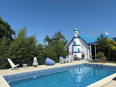 Vila_Santorini_NS wit a swimming pool, sauna, jacuzzi