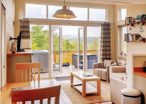 TV - The Tryfan Retreat is a bespoke one bedroom lodge with hot tub. (Bala,)
