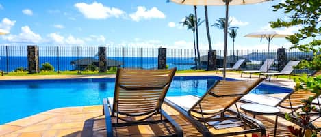 Take a break from exploring Maui and unwind in the peaceful pool area. Comfortable loungers and shade options ensure your perfect relaxation.