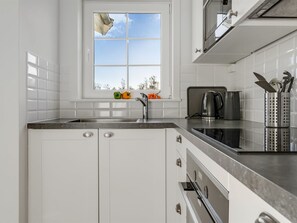 Fridge, microwave, cookware/dishes/utensils