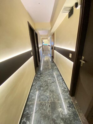 Deluxe kamer, 1 twee- of 2 eenpersoonsbedden | Woonruimte