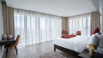 Desk, laptop workspace, blackout drapes, soundproofing